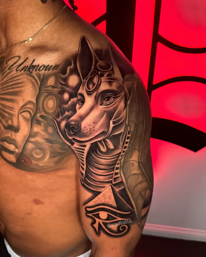 Black and grey tattoo by Dre: anubis, shoulder