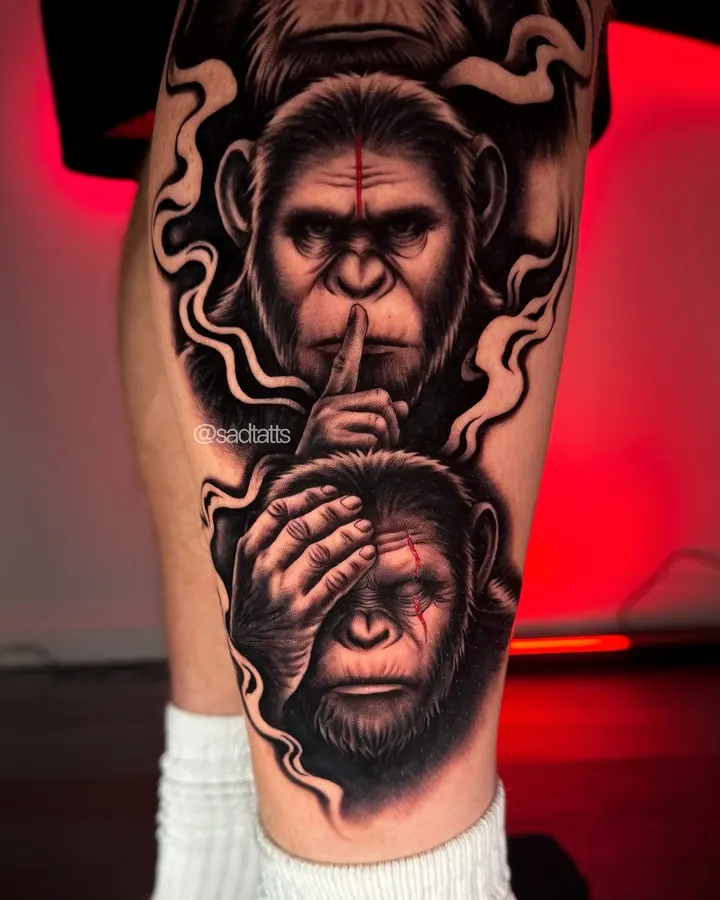Black and grey tattoo by Dre: three wise monkeys, calf