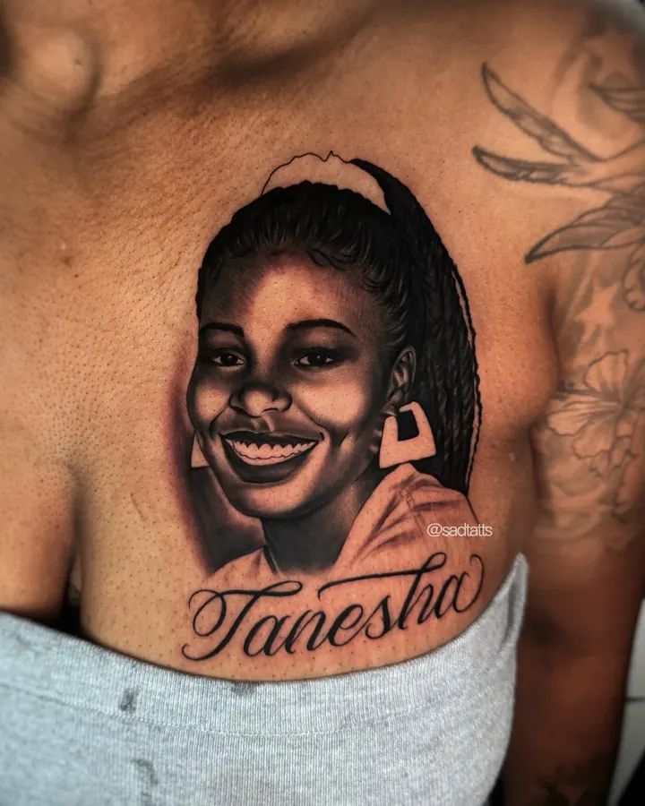 Black and grey tattoo by Dre: woman portrait, chest