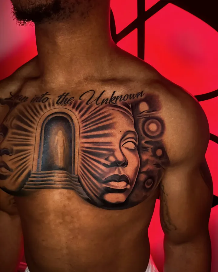 Black and grey tattoo by Dre: Lean into the Unknown, chest (right side)
